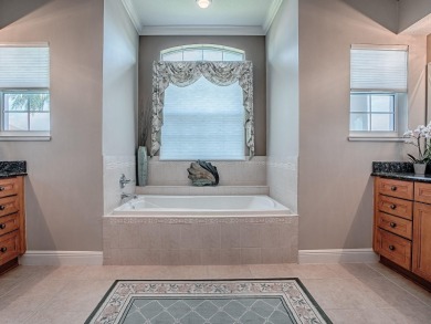 LOVELY CUSTOM ST. SIMON PREMIER home on LARGE CORNER LOT in on The Links of Spruce Creek in Florida - for sale on GolfHomes.com, golf home, golf lot