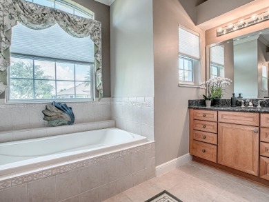 LOVELY CUSTOM ST. SIMON PREMIER home on LARGE CORNER LOT in on The Links of Spruce Creek in Florida - for sale on GolfHomes.com, golf home, golf lot