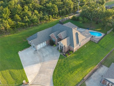 Welcome to 1199 Highland Circle in Greenwood, Arkansas! Located on Vache-Grasse Country Club in Arkansas - for sale on GolfHomes.com, golf home, golf lot