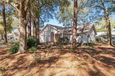 JUST LIKE UP NORTH--DOWN HERE!! Beautiful wooded park setting on On Top of the World Golf Course in Florida - for sale on GolfHomes.com, golf home, golf lot