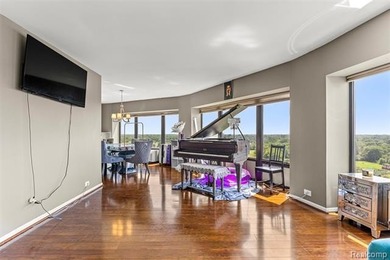 Welcome to this remarkable 2-bedroom, 2-bath residence located on Evergreen Hills Golf Course in Michigan - for sale on GolfHomes.com, golf home, golf lot