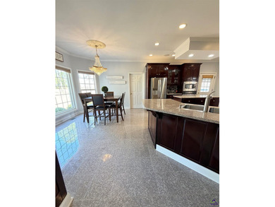 Experience elevated living in this stunning all-brick estate on Southern Hills Golf Club in Georgia - for sale on GolfHomes.com, golf home, golf lot