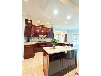 Experience elevated living in this stunning all-brick estate on Southern Hills Golf Club in Georgia - for sale on GolfHomes.com, golf home, golf lot