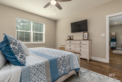 Are you looking for a Gold Fortified home nestled away in *The on Isle Dauphine Club Golf Course in Alabama - for sale on GolfHomes.com, golf home, golf lot