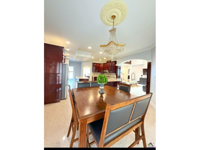 Experience elevated living in this stunning all-brick estate on Southern Hills Golf Club in Georgia - for sale on GolfHomes.com, golf home, golf lot