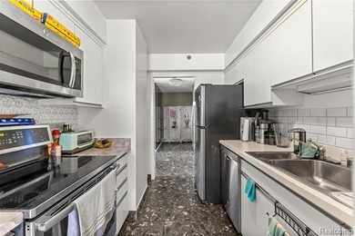 Welcome to this remarkable 2-bedroom, 2-bath residence located on Evergreen Hills Golf Course in Michigan - for sale on GolfHomes.com, golf home, golf lot