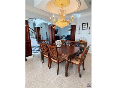 Experience elevated living in this stunning all-brick estate on Southern Hills Golf Club in Georgia - for sale on GolfHomes.com, golf home, golf lot