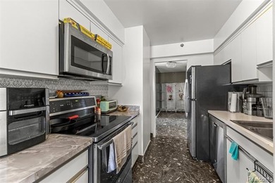 Welcome to this remarkable 2-bedroom, 2-bath residence located on Evergreen Hills Golf Course in Michigan - for sale on GolfHomes.com, golf home, golf lot