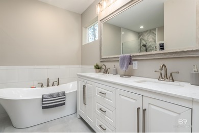 Are you looking for a Gold Fortified home nestled away in *The on Isle Dauphine Club Golf Course in Alabama - for sale on GolfHomes.com, golf home, golf lot