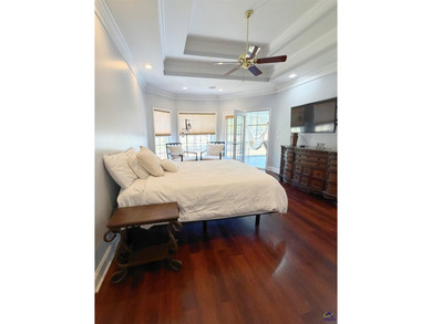 Experience elevated living in this stunning all-brick estate on Southern Hills Golf Club in Georgia - for sale on GolfHomes.com, golf home, golf lot