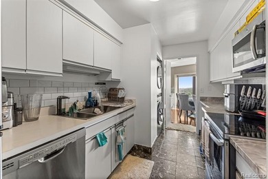 Welcome to this remarkable 2-bedroom, 2-bath residence located on Evergreen Hills Golf Course in Michigan - for sale on GolfHomes.com, golf home, golf lot