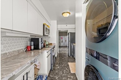 Welcome to this remarkable 2-bedroom, 2-bath residence located on Evergreen Hills Golf Course in Michigan - for sale on GolfHomes.com, golf home, golf lot