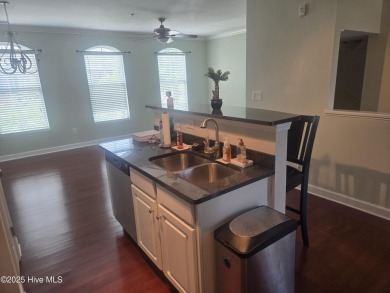 A beach getaway with three bedrooms PLUS an income producing on Sea Trail Golf Resort in North Carolina - for sale on GolfHomes.com, golf home, golf lot