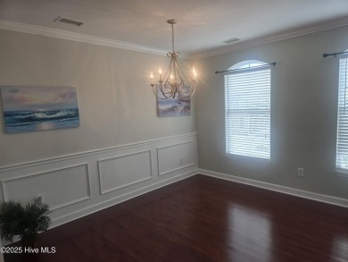 A beach getaway with three bedrooms PLUS an income producing on Sea Trail Golf Resort in North Carolina - for sale on GolfHomes.com, golf home, golf lot