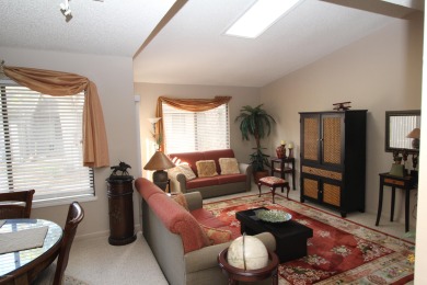 Compact 2 bedroom, 2 bath single-story Villa with an attached on Spruce Creek Golf Club in Florida - for sale on GolfHomes.com, golf home, golf lot