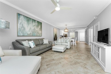 Sweeping golf course AND water views abound from this desirable on Heritage Landing Golf  in Florida - for sale on GolfHomes.com, golf home, golf lot