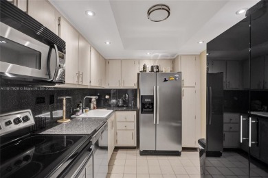 Spacious and beautifully updated 2BD/2BA in the heart of on Turnberry Isle Resort and Club in Florida - for sale on GolfHomes.com, golf home, golf lot