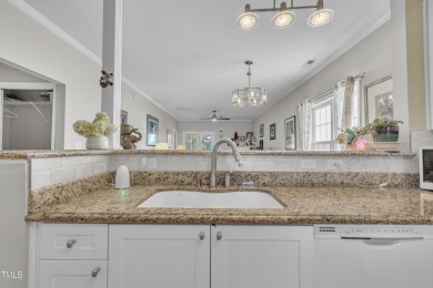 As you enter your new home nestled between the 15th and 16th on Hedingham Golf and Athletic Club in North Carolina - for sale on GolfHomes.com, golf home, golf lot
