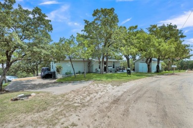 Scenic drive up gives way to a fully remodeled, turnkey home on Nocona Hills Golf Course in Texas - for sale on GolfHomes.com, golf home, golf lot