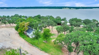 Scenic drive up gives way to a fully remodeled, turnkey home on Nocona Hills Golf Course in Texas - for sale on GolfHomes.com, golf home, golf lot