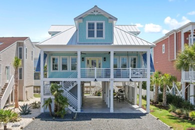 Charming Sunset Beach House custom built in 2023 is simply on Oyster Bay Golf Links in North Carolina - for sale on GolfHomes.com, golf home, golf lot