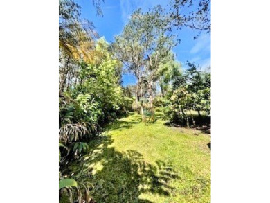 Situated outside the charming Volcano Village in the desirable on Volcano Golf and Country Club in Hawaii - for sale on GolfHomes.com, golf home, golf lot