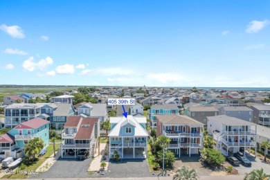 Charming Sunset Beach House custom built in 2023 is simply on Oyster Bay Golf Links in North Carolina - for sale on GolfHomes.com, golf home, golf lot