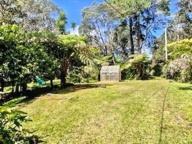 Situated outside the charming Volcano Village in the desirable on Volcano Golf and Country Club in Hawaii - for sale on GolfHomes.com, golf home, golf lot