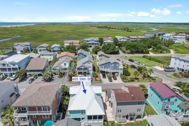 Charming Sunset Beach House custom built in 2023 is simply on Oyster Bay Golf Links in North Carolina - for sale on GolfHomes.com, golf home, golf lot