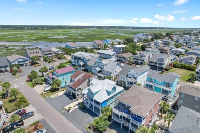 Charming Sunset Beach House custom built in 2023 is simply on Oyster Bay Golf Links in North Carolina - for sale on GolfHomes.com, golf home, golf lot