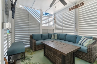Charming Sunset Beach House custom built in 2023 is simply on Oyster Bay Golf Links in North Carolina - for sale on GolfHomes.com, golf home, golf lot