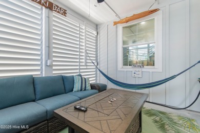 Charming Sunset Beach House custom built in 2023 is simply on Oyster Bay Golf Links in North Carolina - for sale on GolfHomes.com, golf home, golf lot