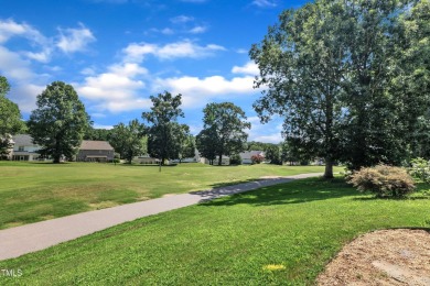 As you enter your new home nestled between the 15th and 16th on Hedingham Golf and Athletic Club in North Carolina - for sale on GolfHomes.com, golf home, golf lot