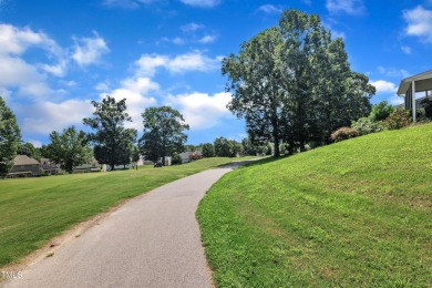 As you enter your new home nestled between the 15th and 16th on Hedingham Golf and Athletic Club in North Carolina - for sale on GolfHomes.com, golf home, golf lot