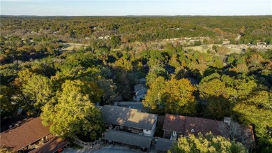 Discover the epitome of convenient living in this charming on Bella Vista Country Club and Golf Course in Arkansas - for sale on GolfHomes.com, golf home, golf lot