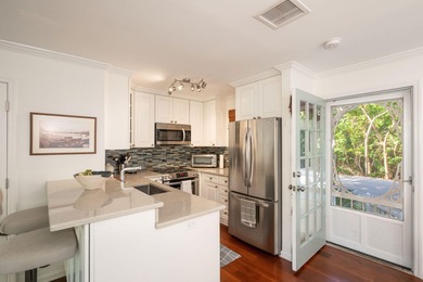 3BR/2.5BA 2-story townhouse with its own private pool and on Key West Golf Club in Florida - for sale on GolfHomes.com, golf home, golf lot