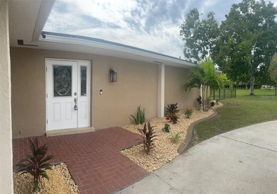 Welcome to this beautifully maintained 3-bedroom, 2-bath, 2-car on Deep Creek Golf Club in Florida - for sale on GolfHomes.com, golf home, golf lot