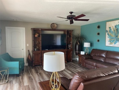 Welcome to this beautifully maintained 3-bedroom, 2-bath, 2-car on Deep Creek Golf Club in Florida - for sale on GolfHomes.com, golf home, golf lot