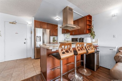 STUNNING 1 BED, 1 BA, 1 PKG w/ in-unit W/D and Central A/C!!! on Honolulu Country Club in Hawaii - for sale on GolfHomes.com, golf home, golf lot