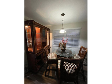 Welcome to this beautifully maintained 3-bedroom, 2-bath, 2-car on Deep Creek Golf Club in Florida - for sale on GolfHomes.com, golf home, golf lot