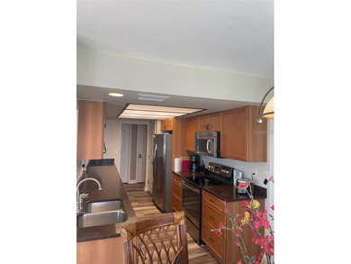 Welcome to this beautifully maintained 3-bedroom, 2-bath, 2-car on Deep Creek Golf Club in Florida - for sale on GolfHomes.com, golf home, golf lot