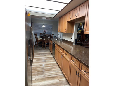 Welcome to this beautifully maintained 3-bedroom, 2-bath, 2-car on Deep Creek Golf Club in Florida - for sale on GolfHomes.com, golf home, golf lot