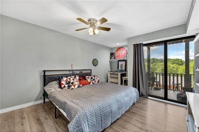 Discover this end-unit townhome with seasonal views of Lake on Bella Vista Country Club - Berksdale in Arkansas - for sale on GolfHomes.com, golf home, golf lot