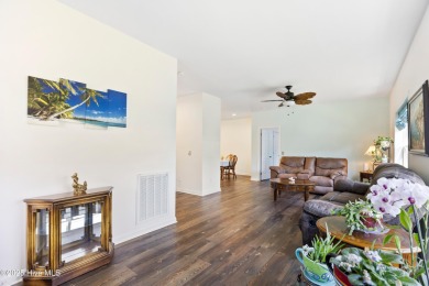 Welcome to this charming 2-bedroom, 2-bath home located just a on Oyster Bay Golf Links in North Carolina - for sale on GolfHomes.com, golf home, golf lot