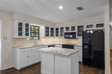 Fantastic curb appeal on this 3BD-2BA brick home in Holly Lake on Holly Lake Ranch Golf Club in Texas - for sale on GolfHomes.com, golf home, golf lot