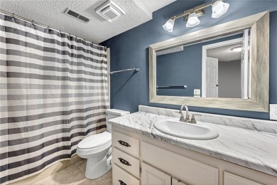 Discover this end-unit townhome with seasonal views of Lake on Bella Vista Country Club - Berksdale in Arkansas - for sale on GolfHomes.com, golf home, golf lot