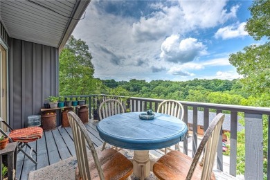 Discover this end-unit townhome with seasonal views of Lake on Bella Vista Country Club - Berksdale in Arkansas - for sale on GolfHomes.com, golf home, golf lot