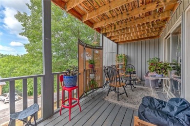 Discover this end-unit townhome with seasonal views of Lake on Bella Vista Country Club - Berksdale in Arkansas - for sale on GolfHomes.com, golf home, golf lot