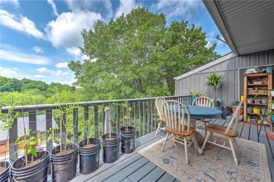 Discover this end-unit townhome with seasonal views of Lake on Bella Vista Country Club - Berksdale in Arkansas - for sale on GolfHomes.com, golf home, golf lot