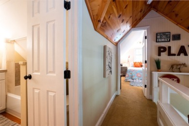 Experience a mountain retreat that makes life simple, secure on Sapphire National Golf Club in North Carolina - for sale on GolfHomes.com, golf home, golf lot